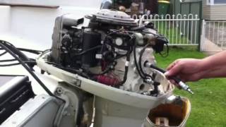 Compression Test on 115 HP Evinrude [upl. by Alihet]