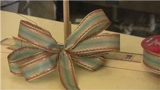 Gift Wrapping Tips  How to Use a Bow Maker [upl. by Anehc]