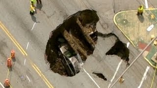 Giant Sinkhole in Ohio Swallows Car Driver Trapped Inside [upl. by Mattias]