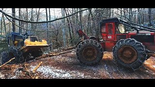 Skidder Pulls Another Skidder Timberjack 240E amp Brimont TM 325 [upl. by Nnaaihtnyc]