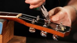 How to String a Gibson Les Paul  Guitar Setup [upl. by Ellga]