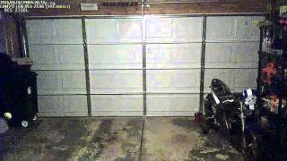 garage door tension spring breaks on security camera [upl. by Erda910]