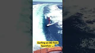 Surfing behind an 80 foot sportfishing yacht  sportfish boat [upl. by Lotta]