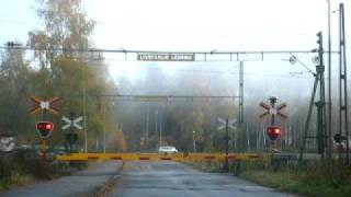 SJTransitio KtK KusttillKust train on a foggy morning at Badstrandsvägen level crossing [upl. by Aynatal]