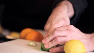 Cutting Lemons and Limes for the Bar  DrinkSkool Bar Techniques [upl. by Jessica]