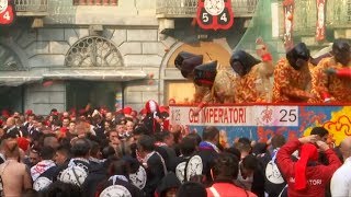 Thousands of Italians turn out for Battle of the Oranges in Italy [upl. by Robaina]