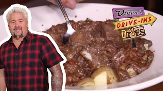 Guy Fieri Eats Irish Guinness Stew in Atlantic Beach  Diners DriveIns and Dives  Food Network [upl. by Ebeohp]