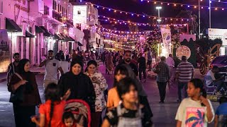 Libyans throng streets of Tripolis old city for summer festival [upl. by Ihsar265]