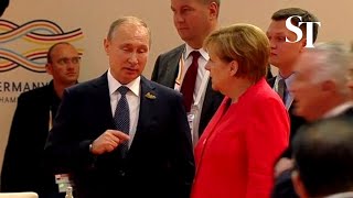 Angela Merkel gives Vladimir Putin epic eye roll [upl. by Laurent]