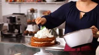 How to Ice a Cake with Whipped Cream  Cake Decorating [upl. by Ellerad]