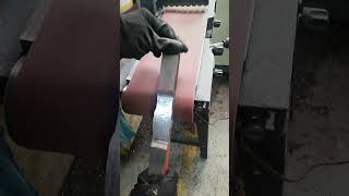 SMOOTHENING THE MACHINED TENSILE SAMPLE ON THE POLISHING BELT AT 600 Grade MECHANICAL TEST [upl. by Diarmit]