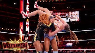 Becky Lynch and Charlotte Flair join forces to brutally punish Ronda Rousey WrestleMania 35 [upl. by Hedda]