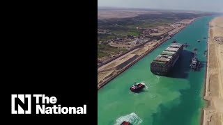 Drone footage captures efforts to free Ever Given in Suez Canal [upl. by Sulrac521]