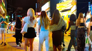 The streets of Hongdae are crowded with tourists even on weekday evenings Seoul [upl. by Ahsrav]