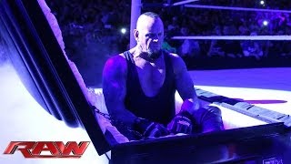 Undertaker rises from a coffin to attack Brock Lesnar Raw March 24 2014 [upl. by Orpha]