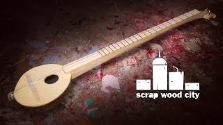 Making a 2 string musical instrument out of coconut and wood [upl. by Hill]