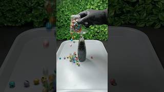 reverse marbles video  oddly satisfying black beads asmr satisfying asmr reverse [upl. by Bolton]