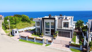 Touring an Ultra Modern Jamaica Beach House for Sale  St Mary Jamaica [upl. by Nihcas298]