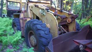 Junkyard in MIDDLE of WOODS with Michigan Loader in  URBEX  Abandoned [upl. by Ayatal]