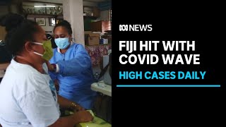 Fijis health system under strain as country reports spikes in COVID19 cases  ABC News [upl. by Bagger503]