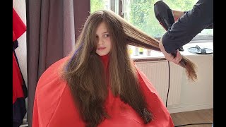 Girl with knee length hair gets a haircut [upl. by Michele]