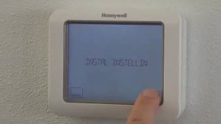 Fabrieksprogramma instellen Chronotherm Touch Modulation  Honeywell Home [upl. by Lipscomb]