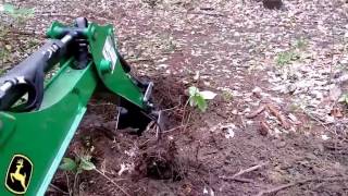 Removing an OLD Stump with the John Deere 1023e Backhoe [upl. by Burl]