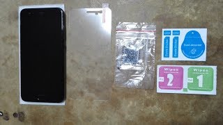 How to apply tempered glass screen protector to mobile phone [upl. by Carlo721]