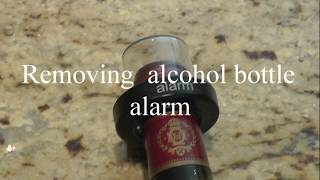 removing alcohol bottle security alarm lock [upl. by Ttihw312]