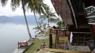 Traditional Batak house Mas Cottages Samosir island lake Toba Sumatra Indonesia [upl. by Agostino]