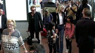 EXCLUSIVE Johnny Hallyday Laetitia Jade and Joy arriving at Paris airport [upl. by Carnay]