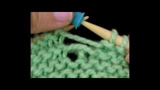 How to knit  How to pick up and fix a dropped stitch a hole in garter stitch knitting tutorial [upl. by Adyela]