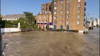 Incredibly high tide on River Thames today flooding pavements [upl. by Garvy707]