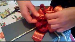 Come fare un fiocco regalo How to make a bow mp4 [upl. by Ethbinium]